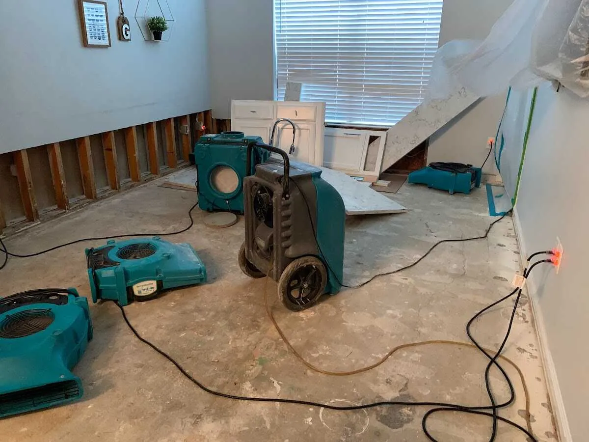 Dehumidifier in flood-cut room for Water Damage Restoration in Newberry